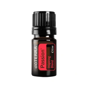 Frasco de Aceite Passion doTERRA sobre fondo cálido y vibrante