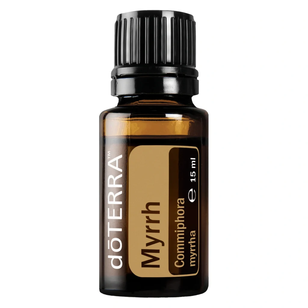 Frasco de Aceite Myrrh doTERRA junto a resina natural de mirra